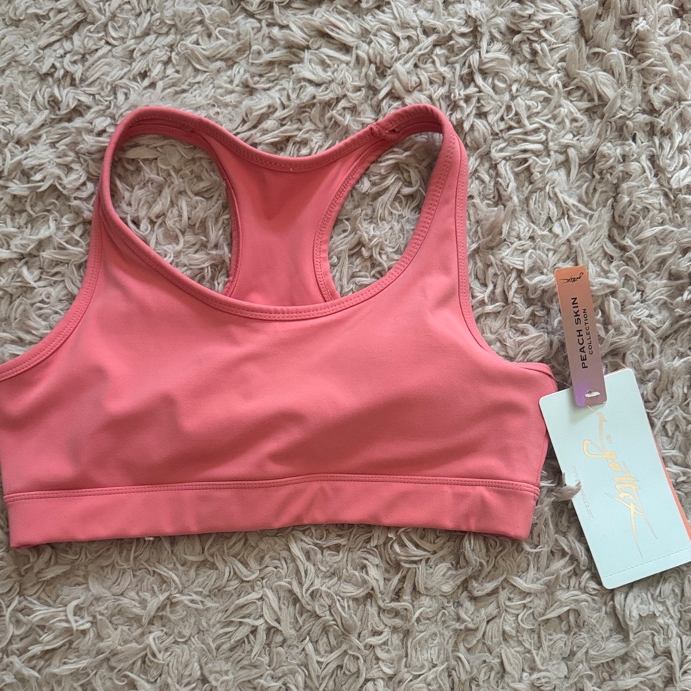 Peach Skin Pink Racerback Sports Bra by Girlfriend Collective